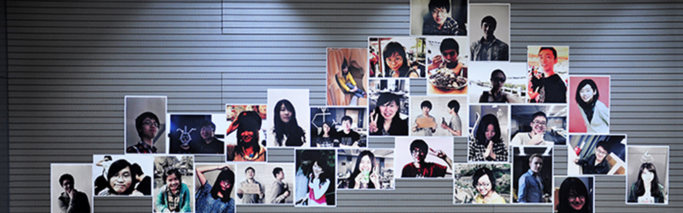 students-photo-on-studio-wall