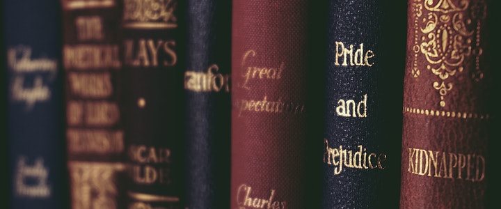 close-up-of-books-on-shelf-1560093